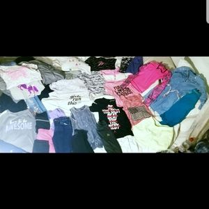 Girls size Medium 8/10 30 piece Tops&bottoms good used condition